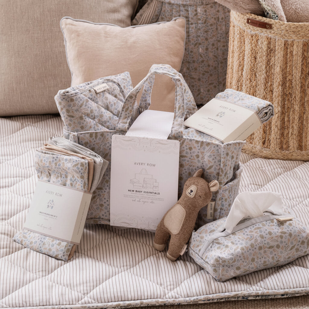 Organic baby nappy caddy orgganiser set in the Nature Trail design with storage and coordinated nursery essentials.