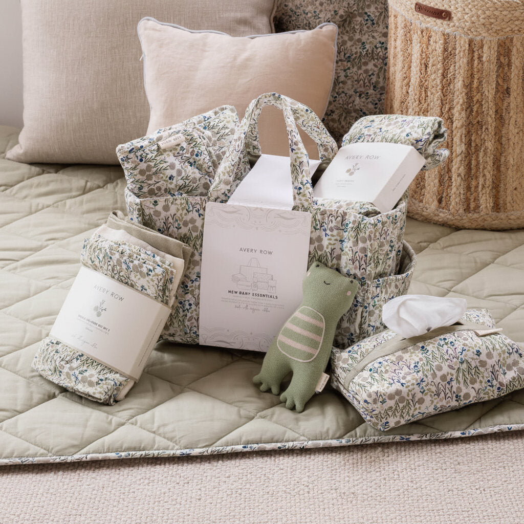 Organic baby nappy caddy organiser set in the Riverbank design with coordinated nursery essentials.