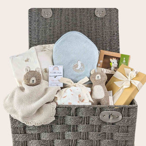Organic new mum gifts. Organic towel, organic sleepsuit, organic bear set and chocolates.