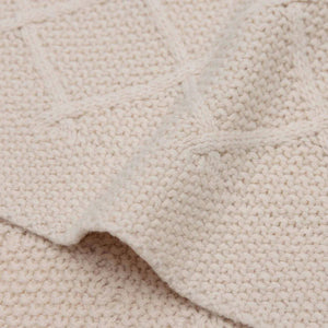 Oatmeal quality heavy knit cotton blanket with diamond knit pattern.