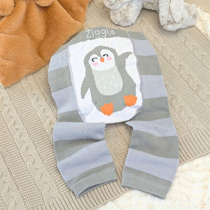 Penguin themed baby leggings in grey stripe and orange.
