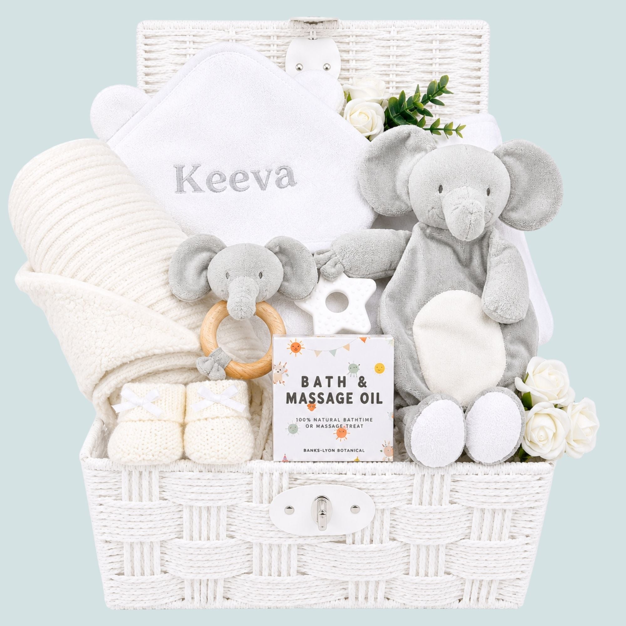 Personalised baby gifts hamper basket with baby toys, embroidered hooded towel and other presents all in white and grey
