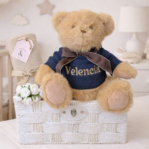 Personalised new baby gifts hamper with a classic teddy bear wearing a jumper