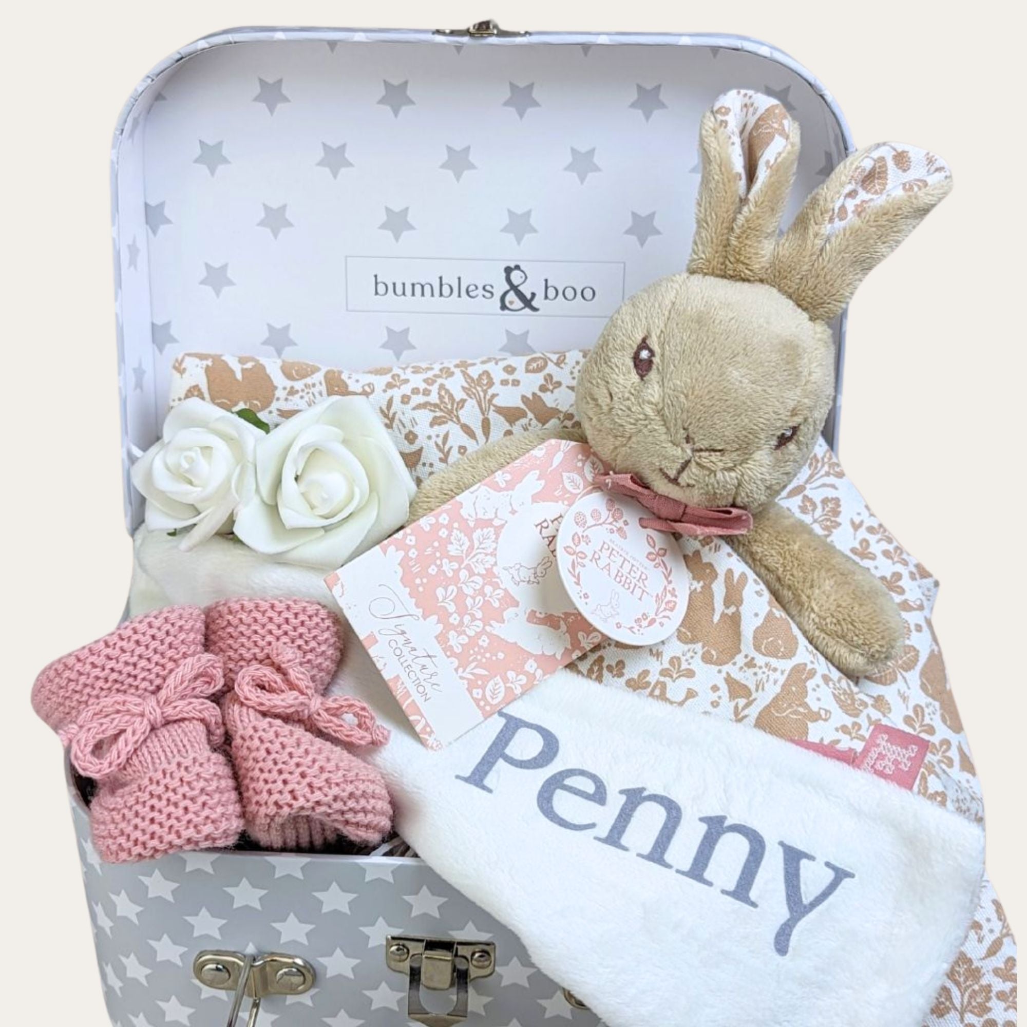 New baby girl gifts hamper with personalised Flopsy Bunny comforter and baby girl knit booties by Bumbles and Boo.