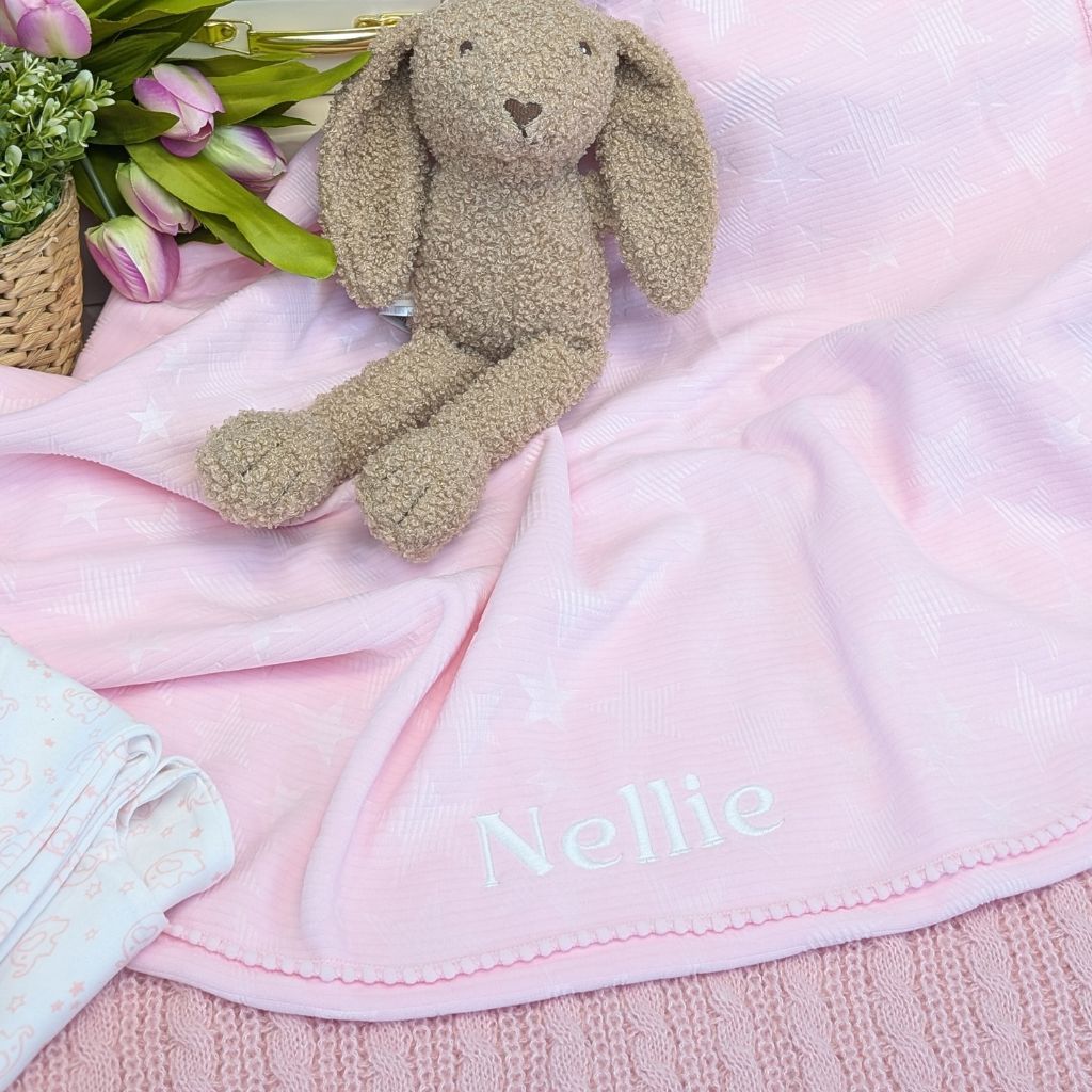 Pink personalised baby girl blanket with stars.