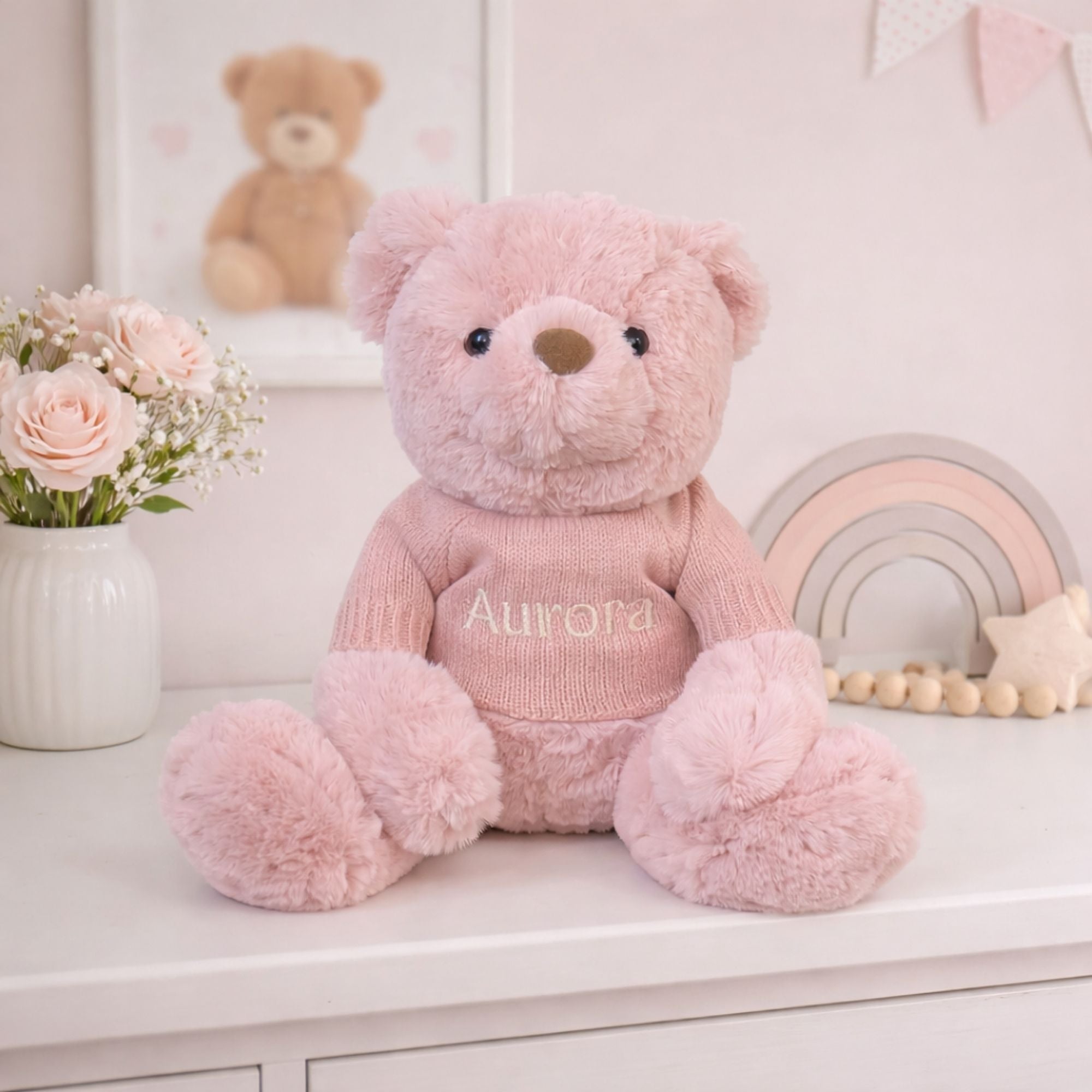 Personalised pink teddy bear with a pink jumper with embroidery