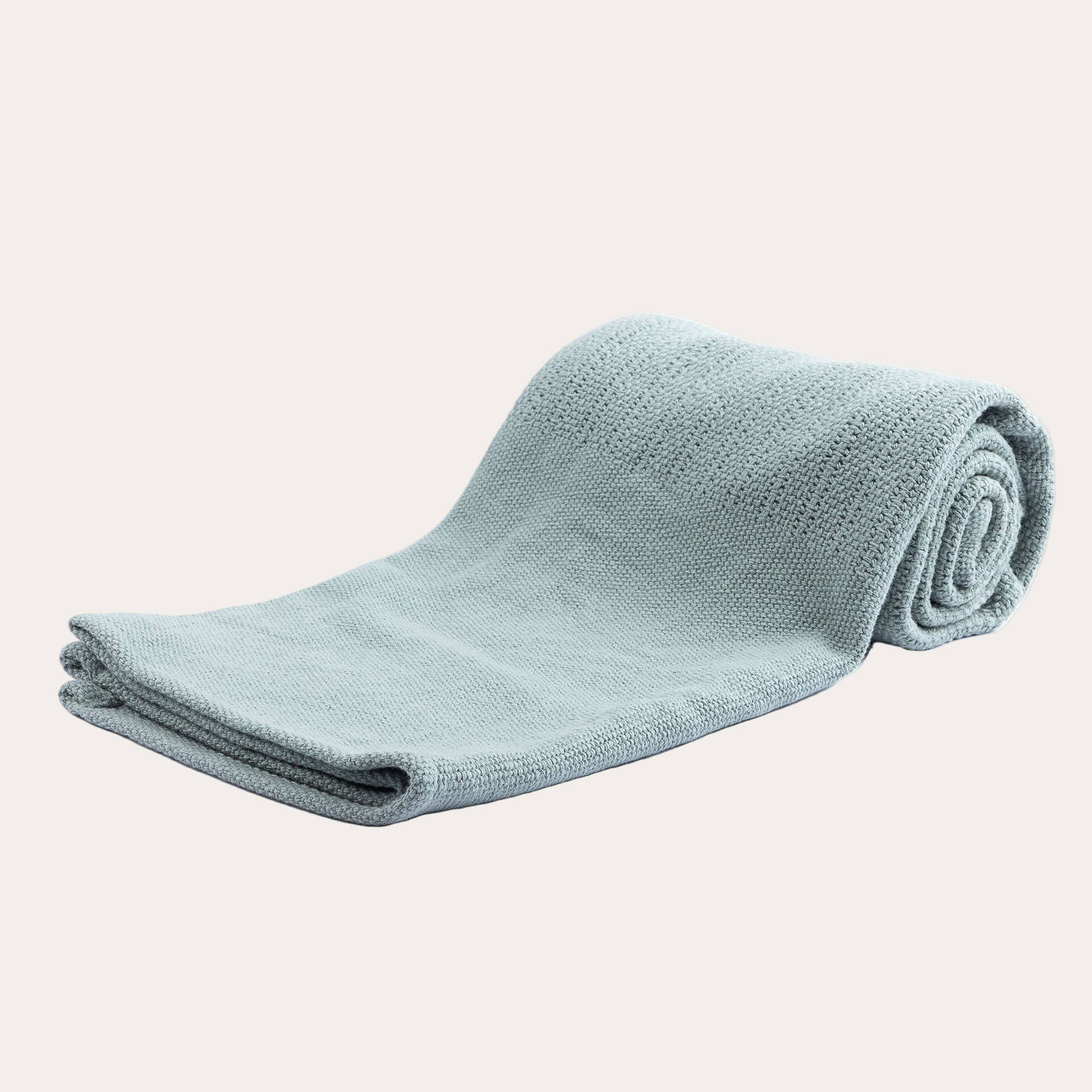 Sage green cotton cellular baby blanket folded, 70 x 90 cm