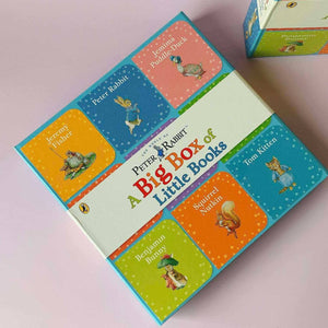 Peter Rabbit little books collection displayed on pink background