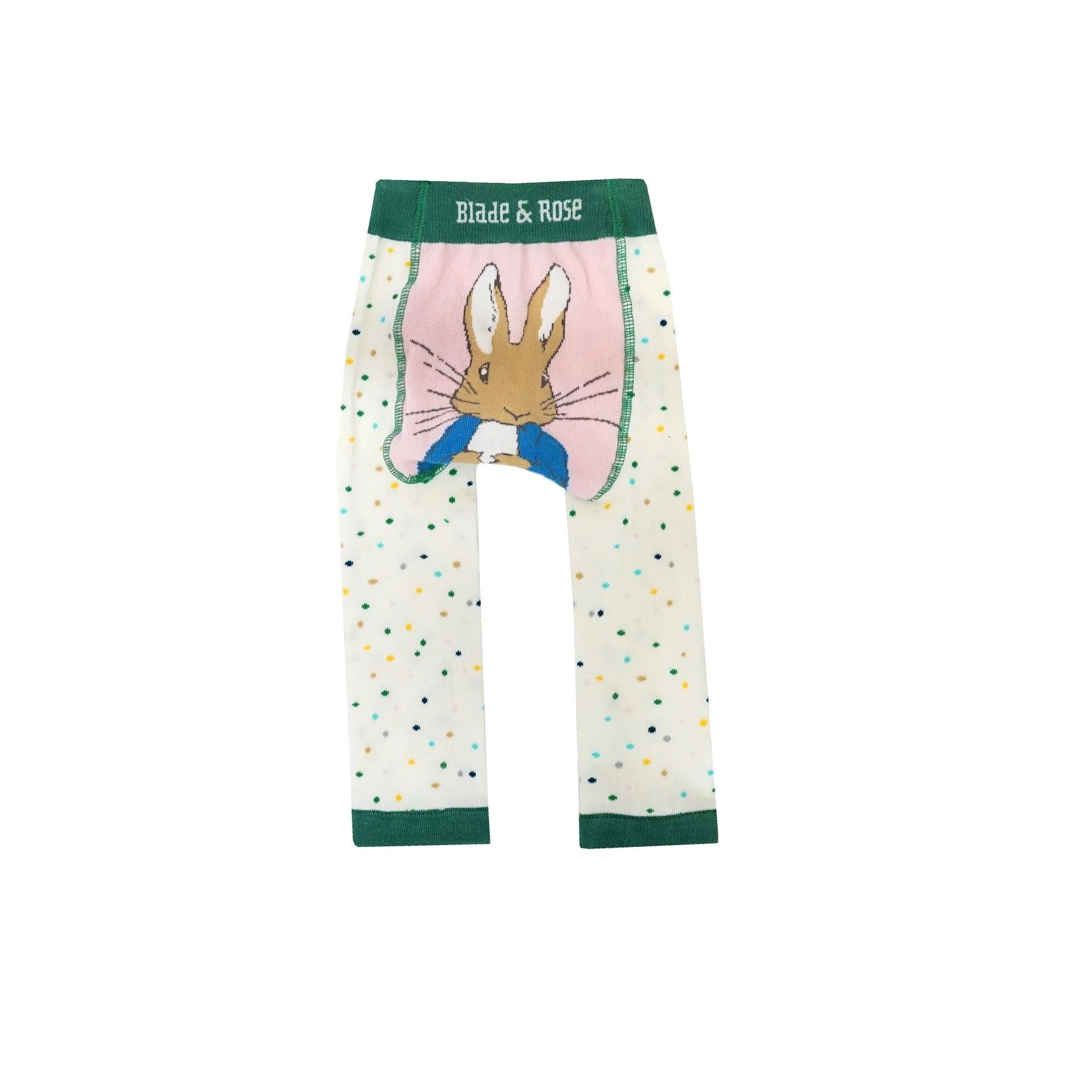 White leggings with a colourful dotty pattern and green accents