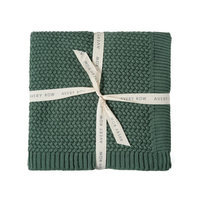 Dark green plait-knit blanket