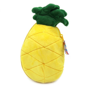 Closed yellow pineapple soft toy with a green leafy top and side zip on a white background.
