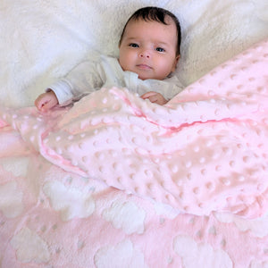 Pink with clouds baby blanket with bubble back.