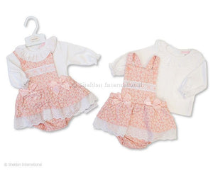 Pink and white floral baby girl dungaree outfit with lace and bow detailing