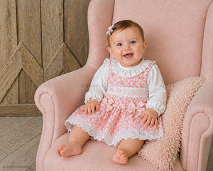 Pink and white baby girl 2 piece dungaree set with lace, bows and floral detailing