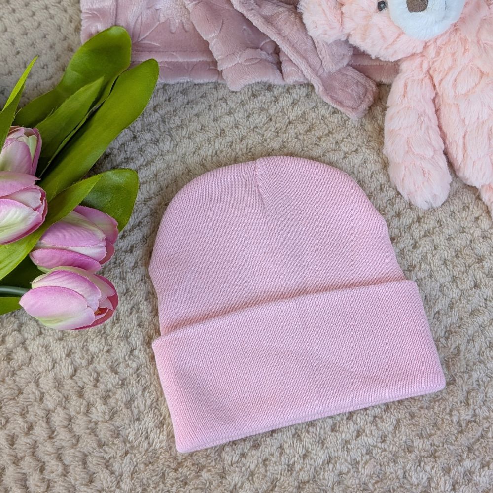 Pink baby beanie hat in knit.