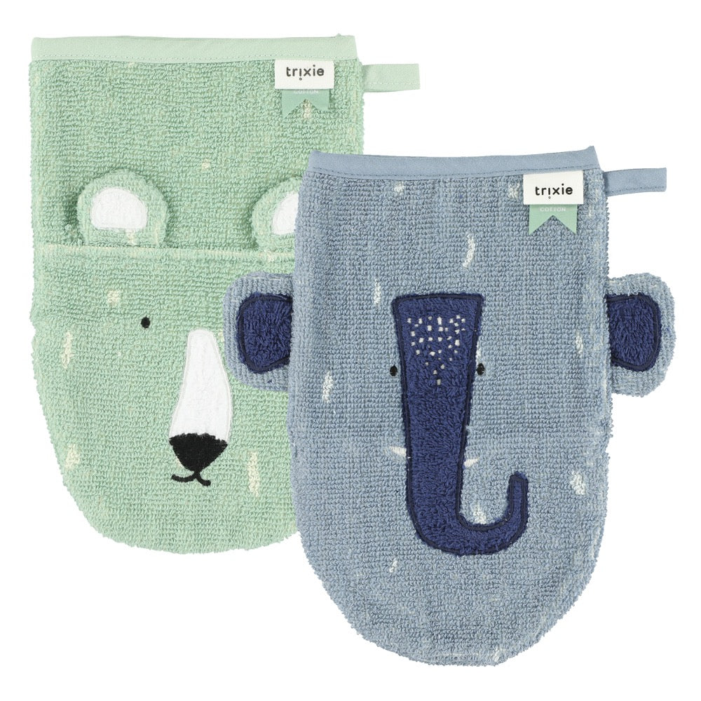 A mint-green polar bear washcloth and a blue elephant washcloth