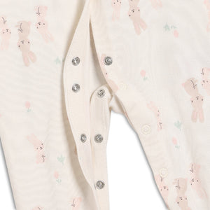 Close up of the poppers on the legs of the sleepsuit.