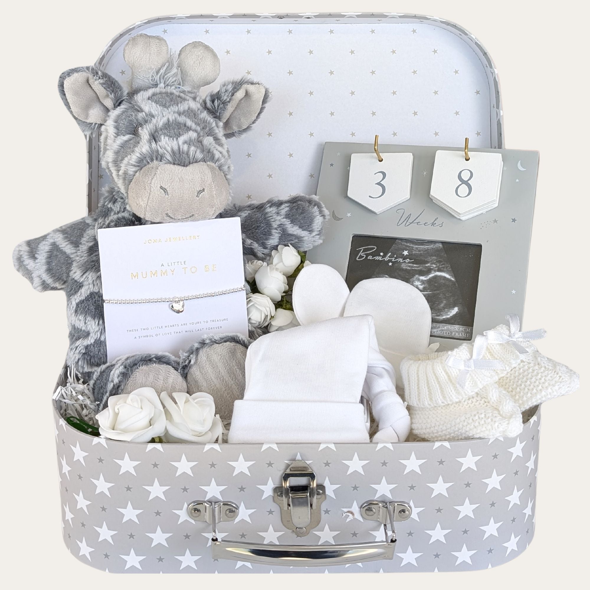 Mum to be hamper packed with pregnancy gifts.