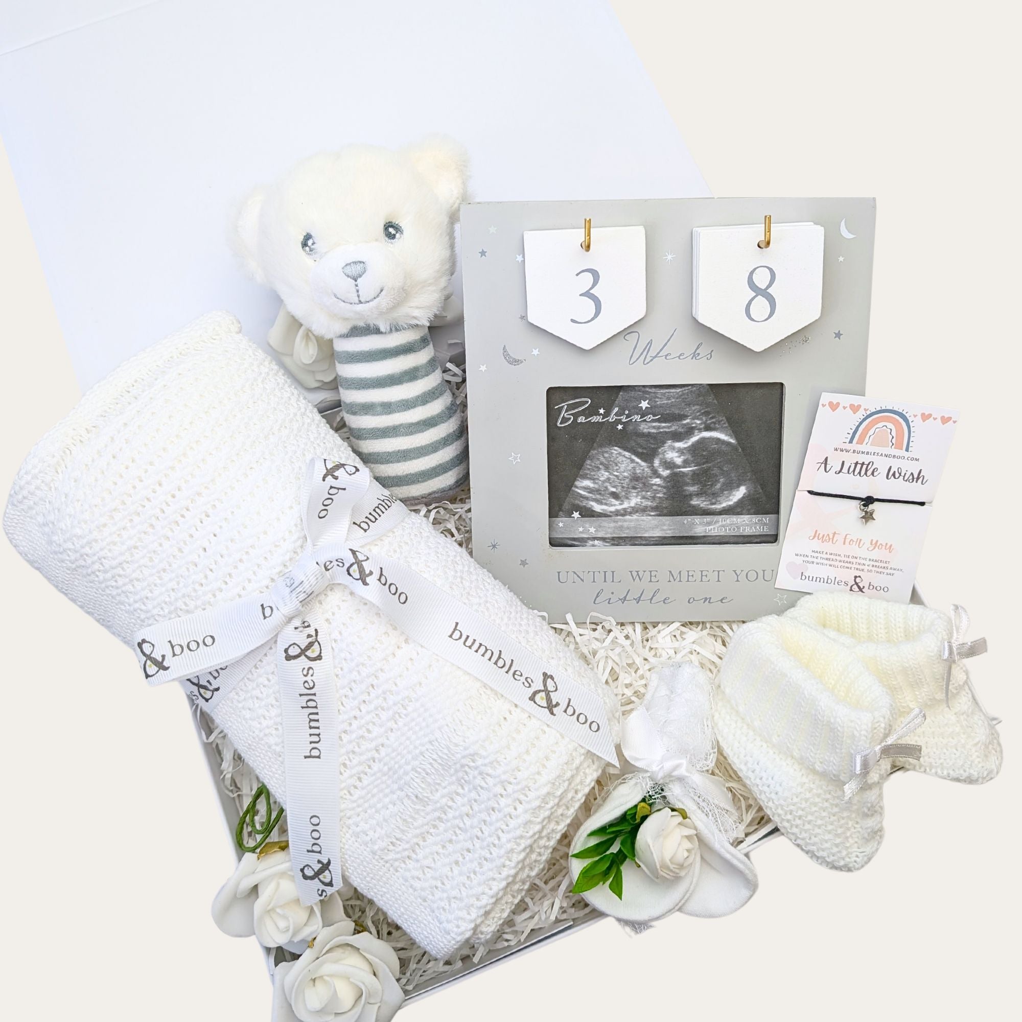 Pregnancy hamper gift box with a countdown frame and mum to be gifts by Bumbles and Boo.