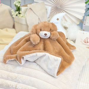 Brown plush teddy comforter which is a puppy