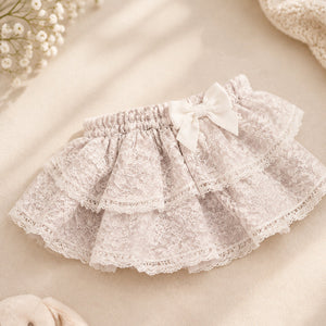 Purple jacquard baby girl outfit with bow detail