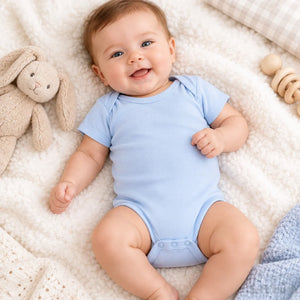 A light blue short-sleeve baby bodysuit with three snap buttons at the crotch
