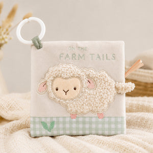 On The Farm soft crinkle baby book featuring Lottie the Lamb a touchy feely tactile sheep on the cover. Clip to attach to the pram