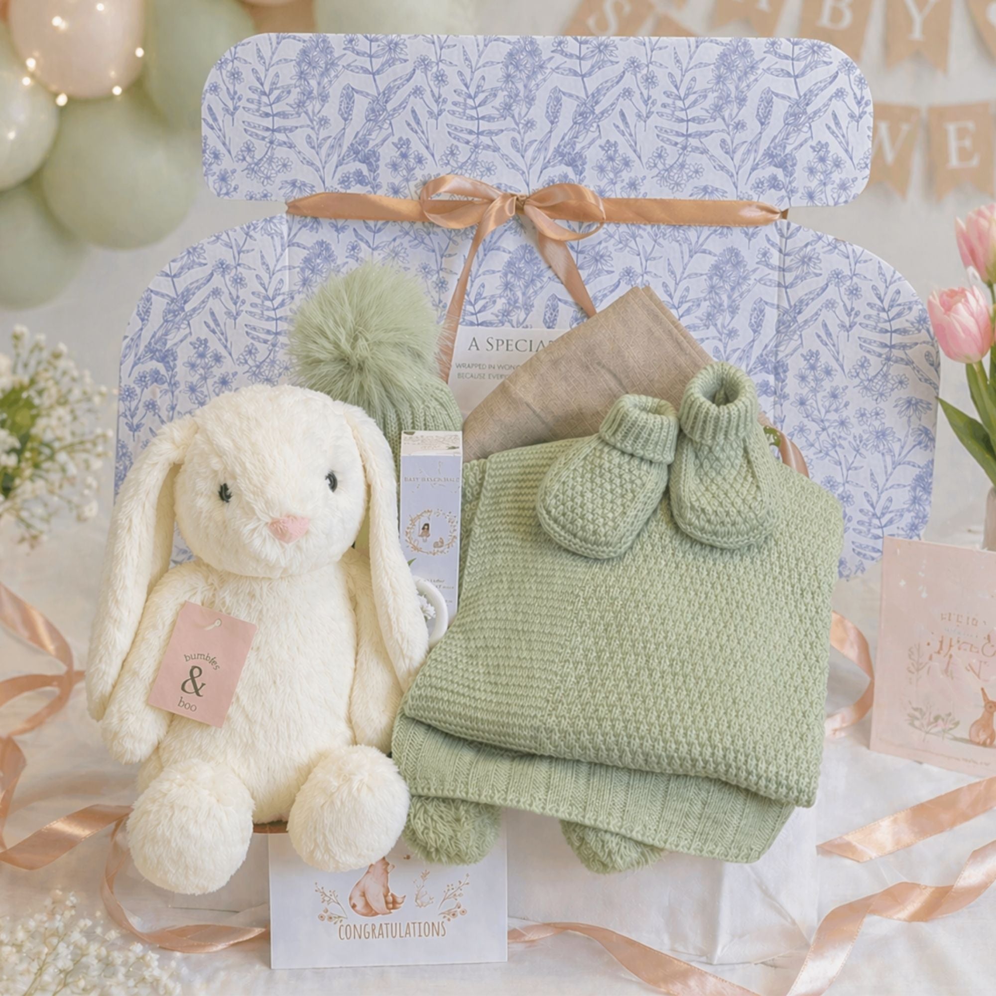 New baby gifts box with knit blanket set and bunny soft toy.
