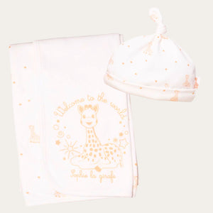Close up of baby blanket and baby hat that is part of the Sophie Le Girafe baby gifts set that in a box with a ribbon. Perfect new baby gift.