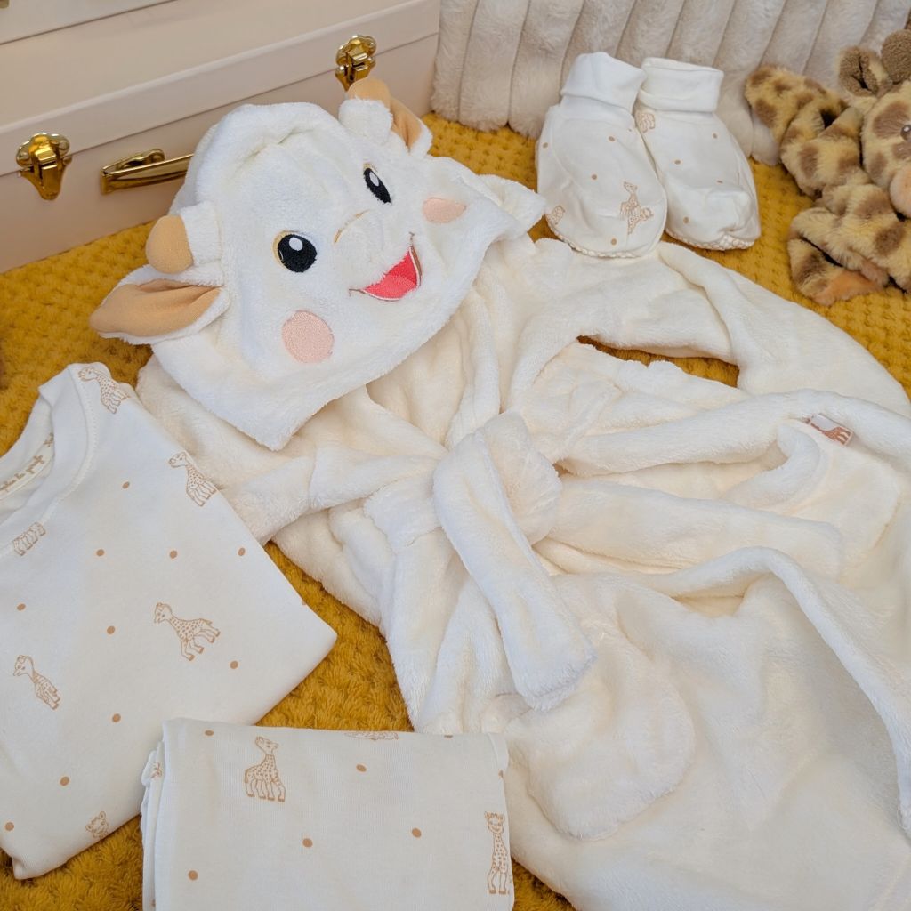 Baby gift set with sophie la girafe bath robe, pjyamas and baby slippers.