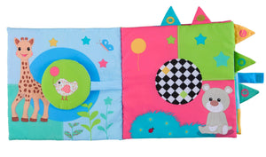 Open Sophie la Girafe Sensitive Book with giraffe and bear illustrations, a bird flap and black-and-white patterned circle
