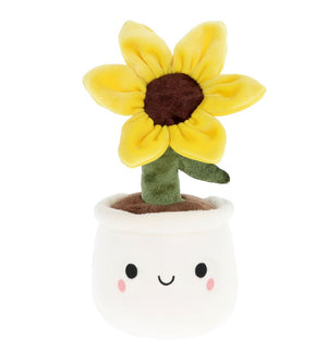 Plush sunflower toy in a pot with a smiling face on a white background