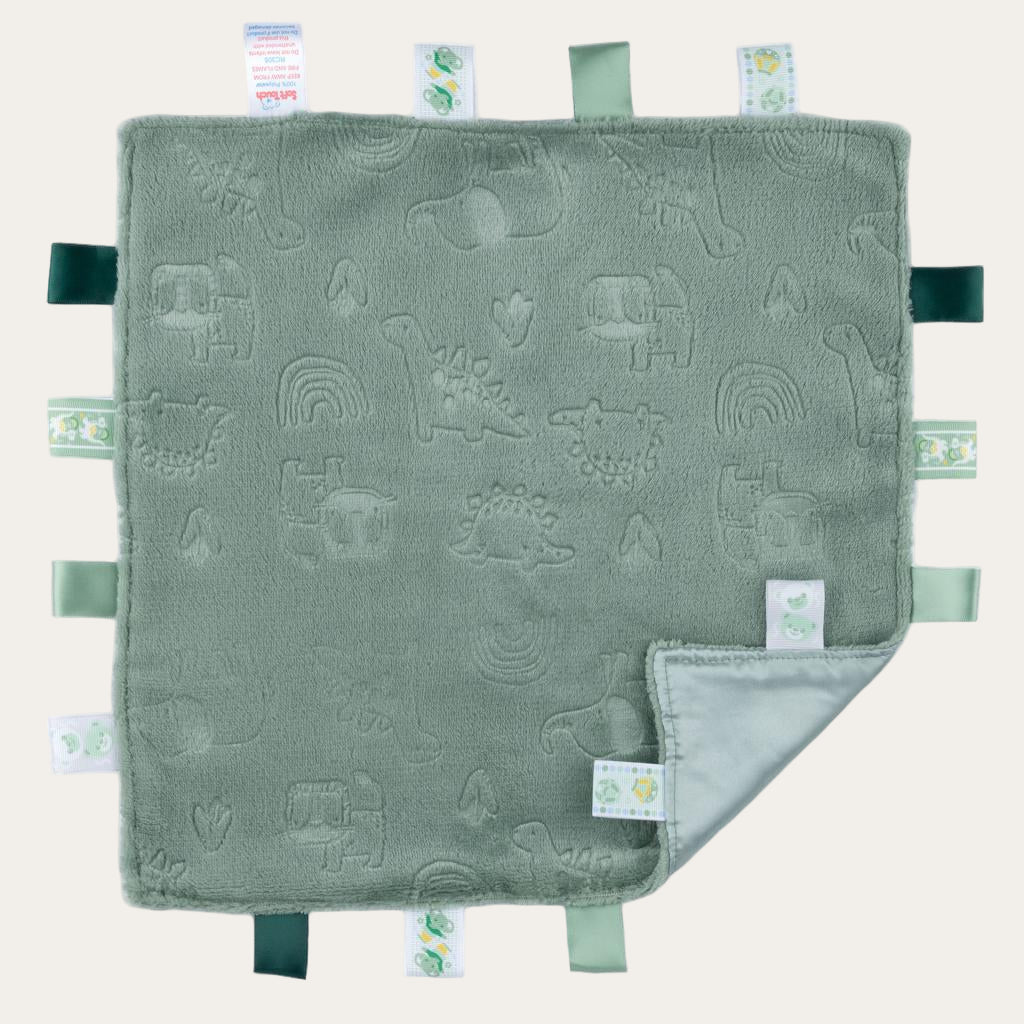 Sage Green Taggie Comforter - closeup of embossed elephant and dino