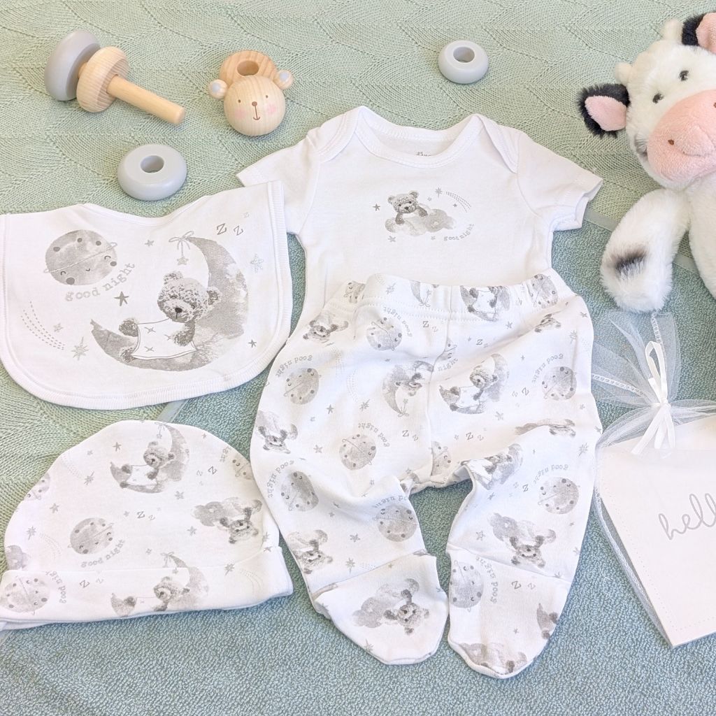 Baby clothing set with a teddy design and part of a gift set