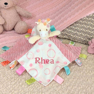 personalised tilly giraffe comforter with tags for sensory play. pink giraffe.