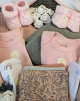 Twins gifts for baby girls. Baby clothing, organic towel, baby toys and baby wash.