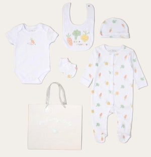 White unisex baby clothing set with newborn essentials