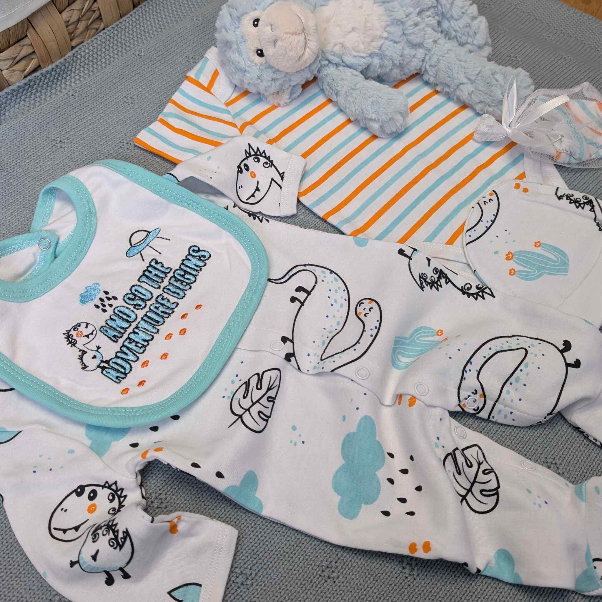 Dinosaur clothing set with orange, green and blue colours. Five piece set.