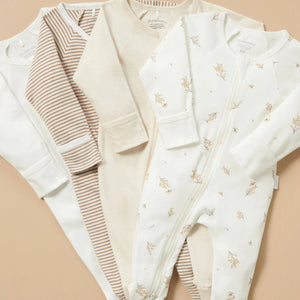 4 pack neutral baby zip growsuits in vanilla and floral