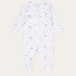 White baby sleepsuit with a grey duck pattern