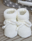 white knit baby booties, gifts for new parents 