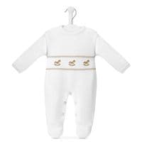 White knitted long-sleeve baby onesie on a hanger, showing the rocking horse appliqué and contrasting front trim.