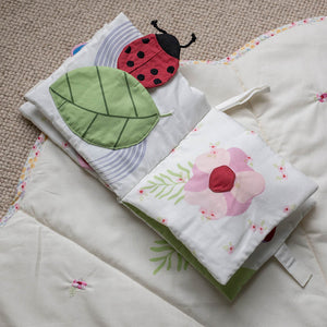 Soft baby fabric book with flower squeaker and garden details