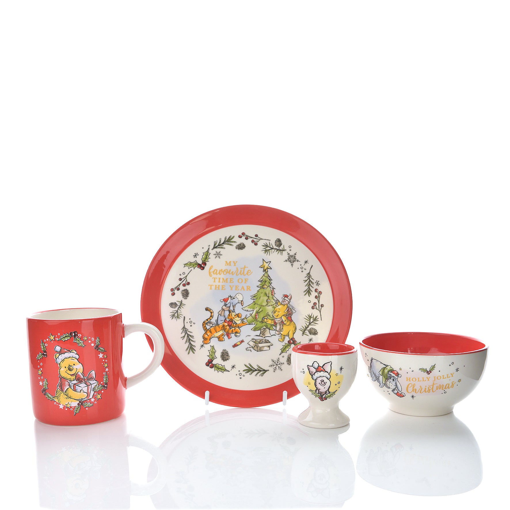 cute Winnie the Pooh ceramics dinner set. This set includes a plate, mug, egg cup and bowl, making it the perfect gift 
