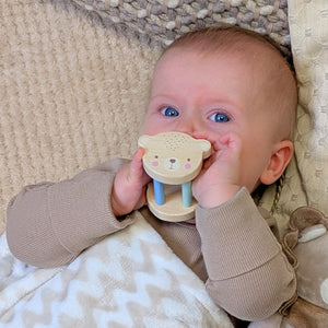 Wooden baby rattle with an animal design