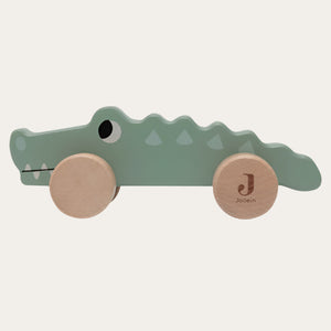 Fun and engaging wooden crocodile toy for 6-month-olds â