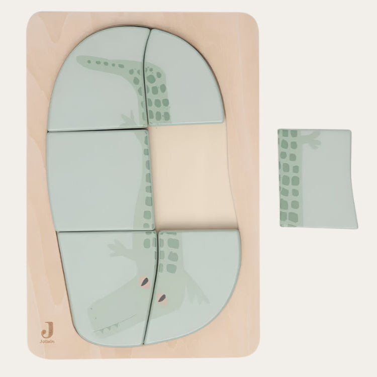 Wooden toy jigsaw puzzle made with FSC-Certified Wood featuring a crocodile image.