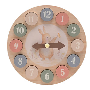 Front view of rabbit learning clock with all twelve coloured number discs in place
