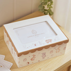 Woodland photo keepsake box on a wooden surface, with its closed photo lid and illustrated animal sides.