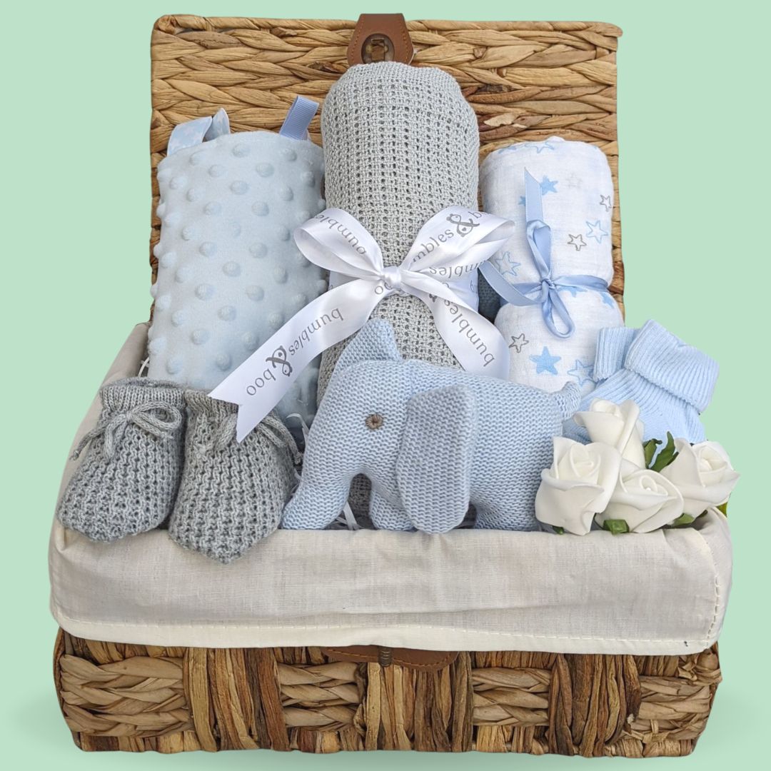 Baby Boy Gifts Hamper with Organic Elephant Rattle, grey cellular blanket, blue taggie and star muslin.